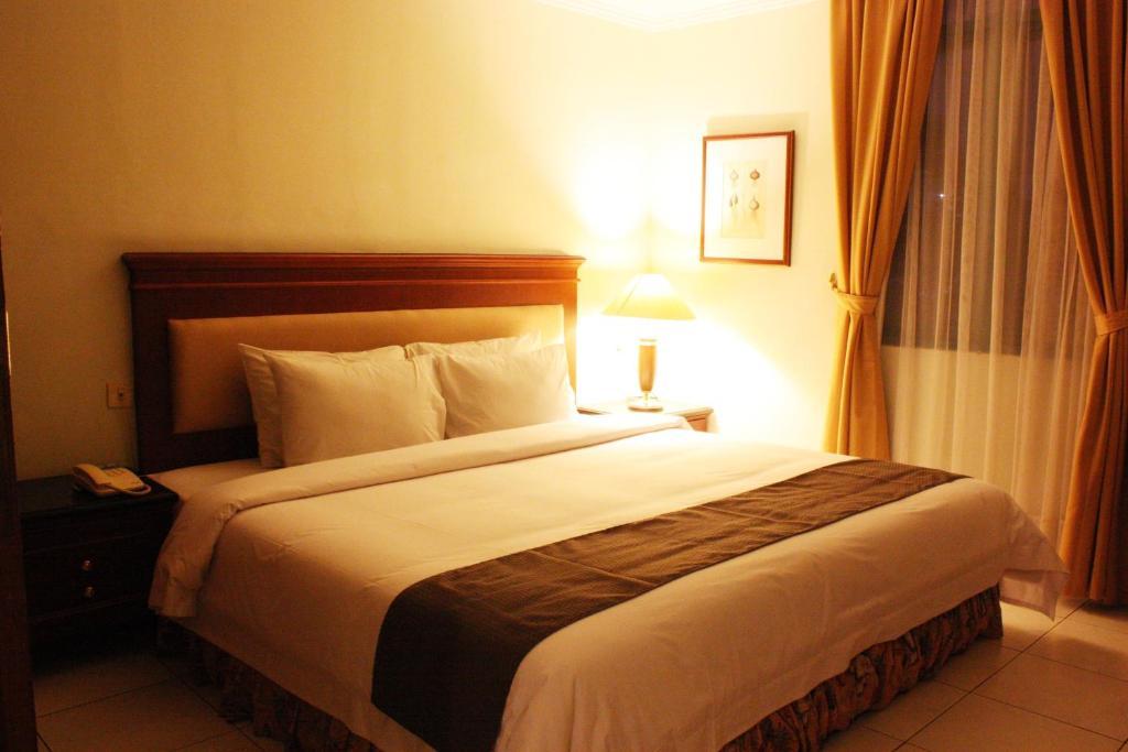 Travellers Suites Serviced Apartments Medan Bilik gambar