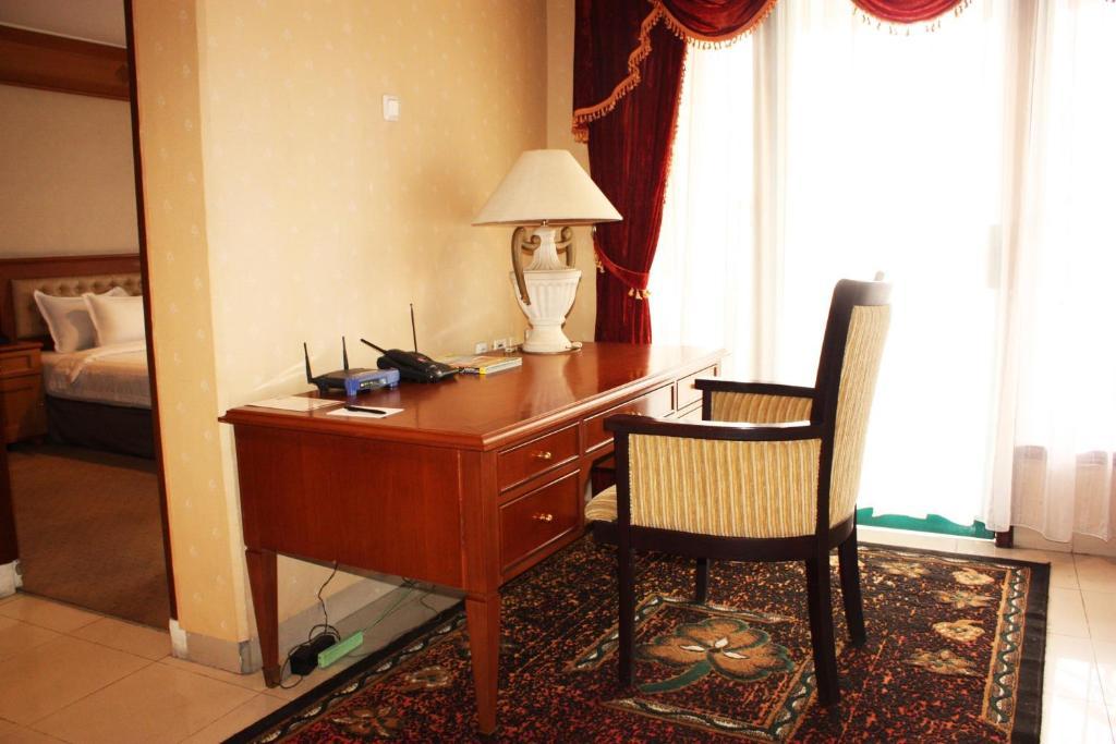 Travellers Suites Serviced Apartments Medan Bilik gambar
