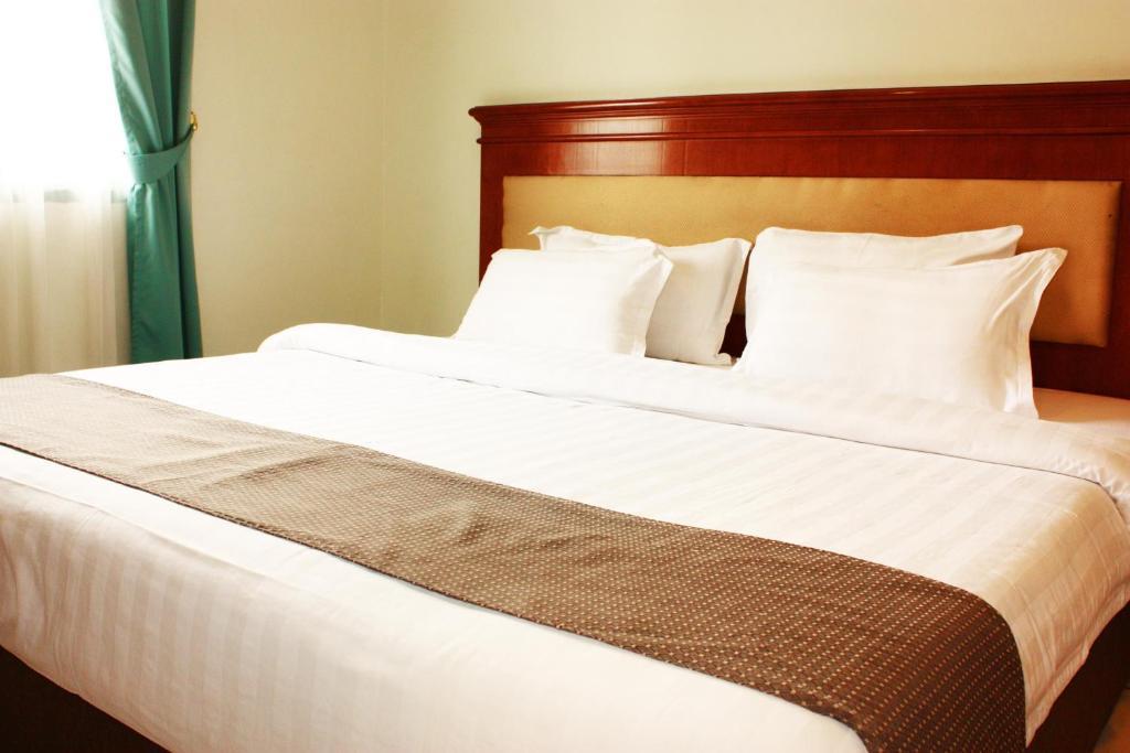 Travellers Suites Serviced Apartments Medan Bilik gambar